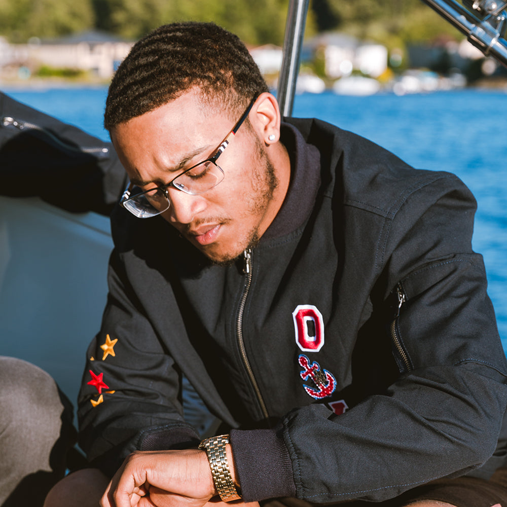 Oy Brand male model on yacht with  jacket  